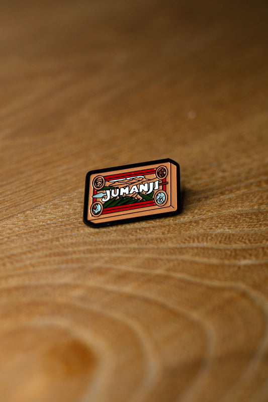 Pin "JUMANJI"